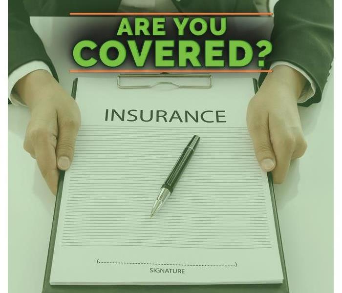 Hands holding an insurances form, Large Font letters saying " ARE YOU COVERED"